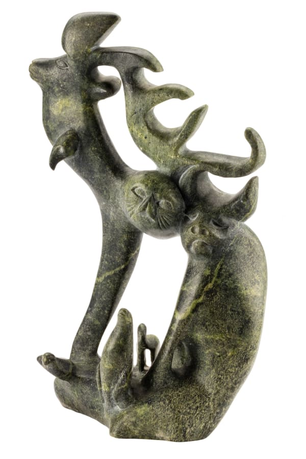 Lot 35 OSUITOK IPEELEE, R.C.A. (1922 or 1923-2005) KINNGAIT (CAPE DORSET Caribou Composition, c. 1968-70 stone, 13.5 x 8 x 5 in (34.3 x 20.3 x 12.7 cm) ESTIMATE: $25,000 — $35,000 PRICE REALIZED: $24,000.00