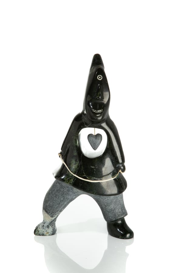 LOT 54 SIMON OOLEEKATELIK (1942-) TALOYOAK (SPENCE BAY) Good Hearted Man stone and string, 16.75 x 9.5 x 4.5 in (42.5 x 24.1 x 11.4 cm) ESTIMATE: $1,000 — $1,500