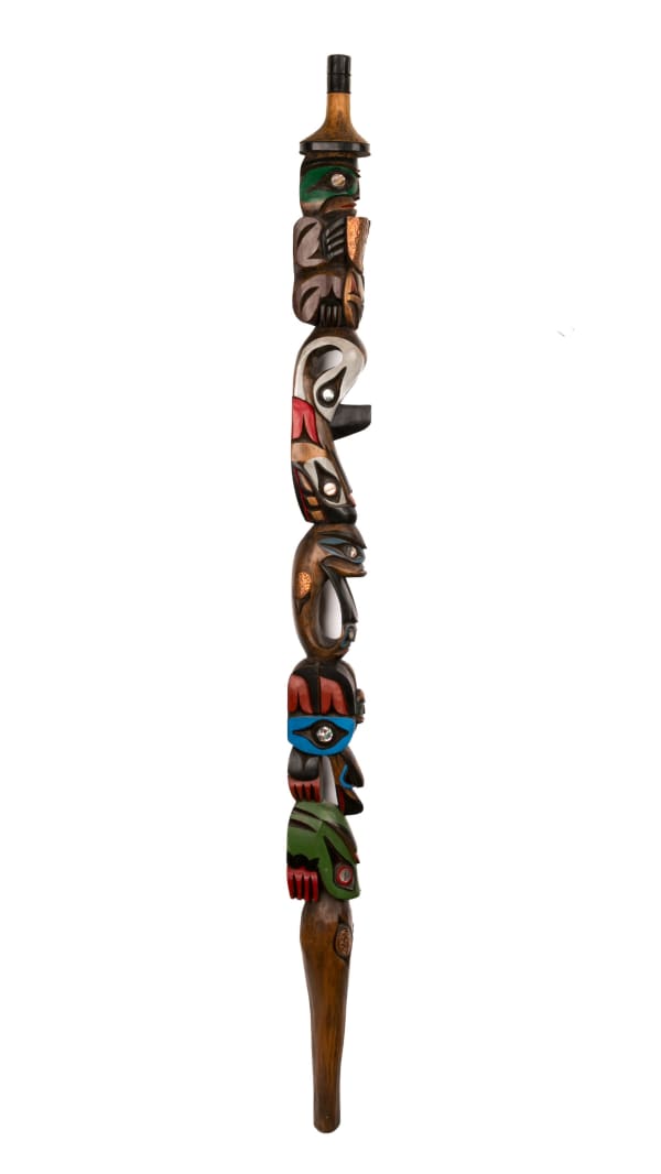 Lot 29 WILLIAM "BILL" KUHNLEY SR., NON-INDIGENOUS Model Talking Stick, c. 1998 cedar wood, acrylic paint, abalone, and copper, 48.25 x 2.25 x 3.75 in (122.6 x 5.7 x 9.5 cm) ESTIMATE: $800 — $1,200 PRICE REALIZED: $2,318.00