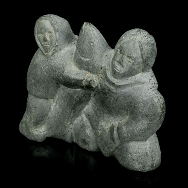 Lot 29 ADA EYETOAQ (1934-) QAMANI'TUAQ (BAKER LAKE) Mother and Child, with Fish, 1985 stone, 3.56 x 4.25 x 2.25 in (9 x 10.8 x 5.7 cm) ESTIMATE: $200 — $400 PRICE REALIZED: $488.00