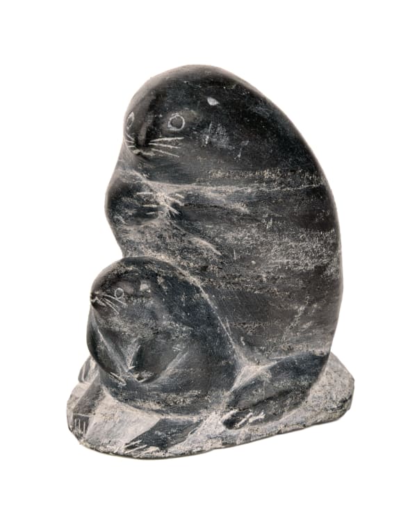 Lot 39 MAKUSI PANGUTU ANAUTA (1939-), PUVIRNITUQ (POVUNGNITUK) / AKULIVIK Mother Lemming, Sheltering her Young, 1961 stone, 3 x 2 x 2.75 in (7.6 x 5.1 x 7 cm) ESTIMATE: $100 — $200 PRICE REALIZED: $48.80