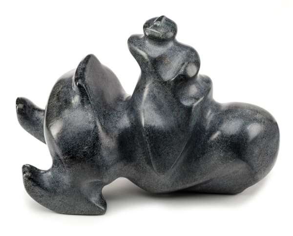 Lot 84 GEORGE ARLUK (1949-2023) ARVIAT (ESKIMO POINT) Man on a Snowmobile, 1993 stone, 6 x 10 x 5 in (15.2 x 25.4 x 12.7 cm) ESTIMATE: $1,200 — $1,800 PRICE REALIZED: $960.00