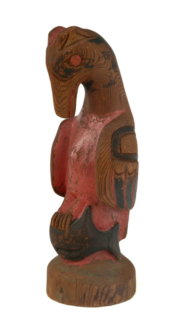 Lot 146 UNIDENTIFIED TLINGIT ARTIST Bird and Captured Whale, c. 1890s-1900 wood and paint, 12.5 x 4 x 4.25 in (31.8 x 10.2 x 10.8 cm) ESTIMATE: $1,000— $1,500