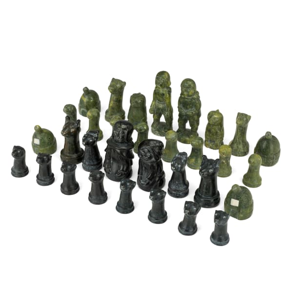 Lot 126 QAQAQ (KAKA) ASHOONA (1928-1996) KINNGAIT (CAPE DORSET) Set of Chess Pieces, 1979 stone and antler, the white king, largest: 4.5 x 1.5 x 1.25 in (11.4 x 3.8 x 3.2 cm) ESTIMATE: $4,000 — $6,000
