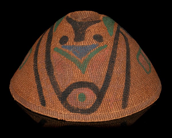 Lot 47 UNIDENTIFIED NUU-CHAH-NULTH or MAKAH ARTIST Painted Rain Hat with Bubble Feeding Baleen Humpback Whale Design, c. 1920s or 1930s cedar bark and spruce root , 5.5 x 13 x 13 in (14 x 33 x 33 cm) ESTIMATE: $1,200 — $1,800 PRICE REALIZED: $1,586.00