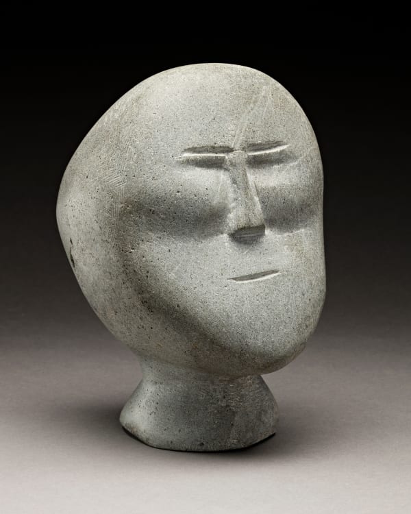 Lot 127 JOHN TIKTAK, R.C.A. (1916-1981) KANGIQLINIQ (RANKIN INLET) Head, c. 1964-65 stone, 8 x 5 x 5.75 in (20.3 x 12.7 x 14.6 cm) ESTIMATE: $30,000 — $50,000 PRICE REALIZED: $27,600.00
