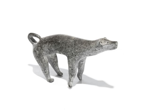 Lot 63 UNIDENTIFIED ARTIST, KANGIQLINIQ (RANKIN INLET) Howling Dog, c. 1955 stone, 3 x 5.5 x 1.25 in (7.6 x 14 x 3.2 cm) PRICE REALIZED: $393.60