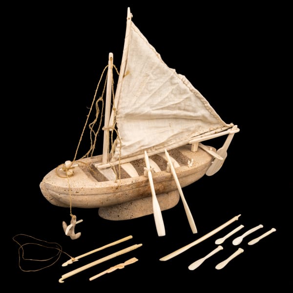 Lot 11 UNIDENTIFIED INUIT ARTIST, EASTERN CANADIAN ARCTIC Model Whale Boat, c. 1953 whale bone, cotton fabric, string, and ivory, 5.5 x 6.5 x 2.75 (14 x 16.5 x 7 cm) ESTIMATE: $800 — $1,200 PRICE REALIZED: $671.00