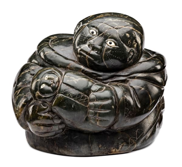 Lot 39 JOHNNY INUKPUK, R.C.A. (1911-2007) INUKJUAK (PORT HARRISON) Mother Holding a Swaddled Infant, c. 1953-54 stone, ivory, and black inlay, 9 x 9 x 12 in (22.9 x 22.9 x 30.5 cm) ESTIMATE: $30,000 — $50,000 PRICE REALIZED: $27,600.00