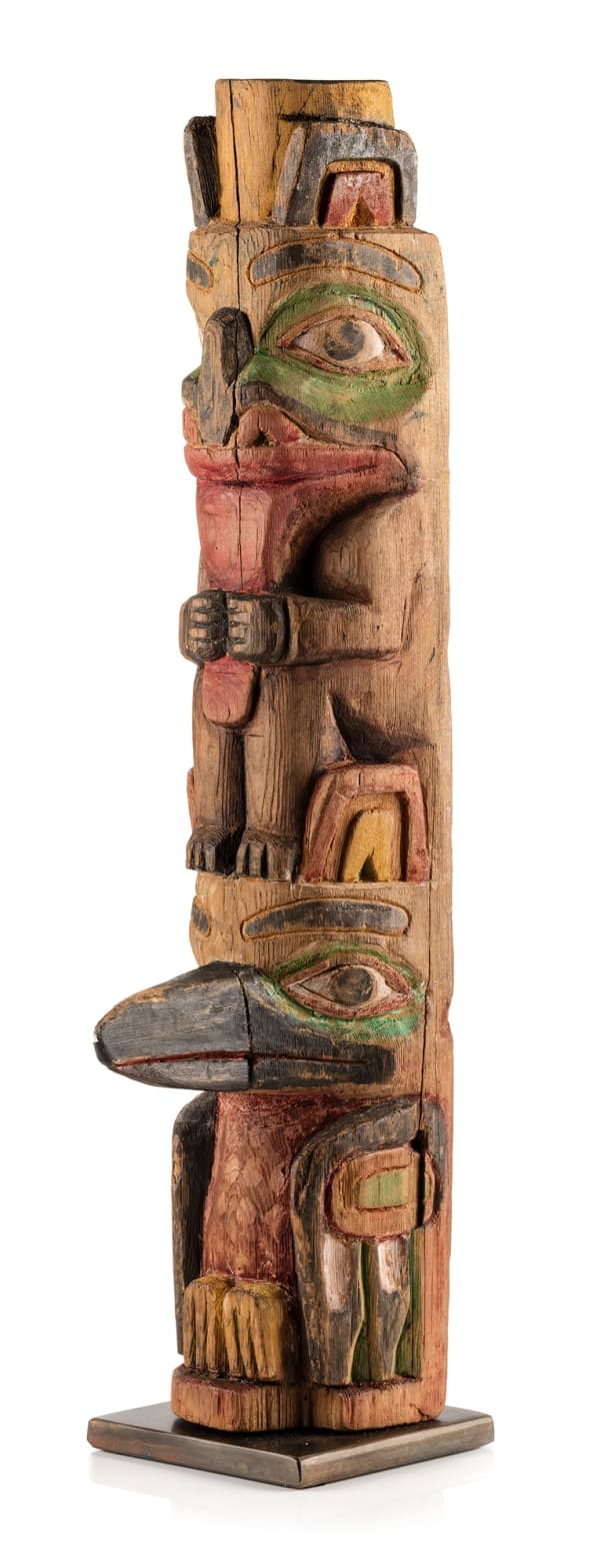 Lot 123 ROBERT RIDLEY (1855-1934) HAIDA Model Hollow Back Totem Pole, c. 1900-1915 cedar wood and pigment, 16 x 5 x 3.25 in (40.6 x 12.7 x 8.3 cm) ESTIMATE: $2,000 — $3,000 PRICE REALIZED: $5,368.00