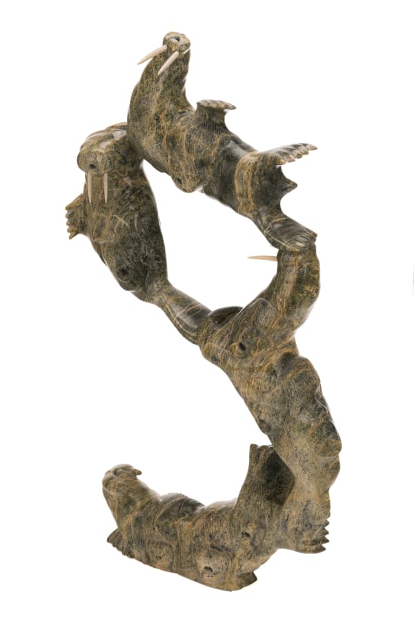 Lot 7 PUDLALIK SHAA (1965-) KINNGAIT (CAPE DORSET) Man and Walrus Ballet, 1990s stone and antler, 28 x 13 x 4.25 in (71.1 x 33 x 10.8 cm) ESTIMATE: $1,500 — $2,500 PRICE REALIZED: $2,074.00
