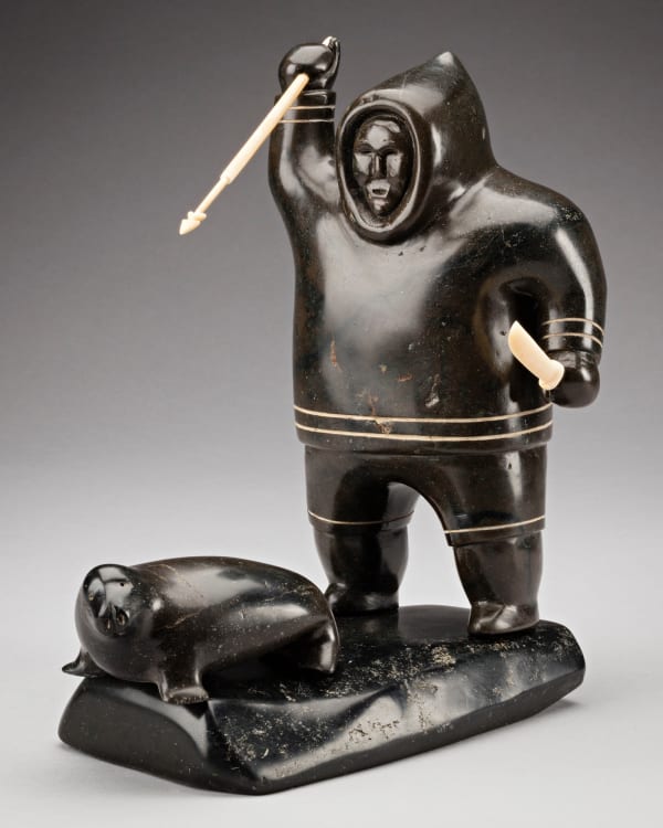 LOT 116 AKEEAKTASHUK (1898-1954) INUKJUAK (PORT HARRISON) Hunter Pursuing a Seal, c. 1951 stone, ivory, and soap inlay, 9.5 x 9.25 x 5.5 in (24.1 x 23.5 x 14 cm) ESTIMATE: $12,000 — $18,000 PRICE REALIZED: $10,800.00