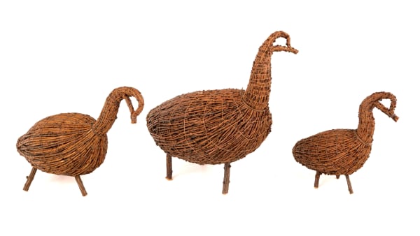 Lot 34 UNIDENTIFIED JAMES BAY (EASTERN) CREE ARTIST Family of Tamarack Geese, c. 1980s tamarack twigs and sting, the largest: 7.25 x 7 x 5.5 in (18.4 x 17.8 x 14 cm) ESTIMATE: $100 — $150 PRICE REALIZED: $219.60