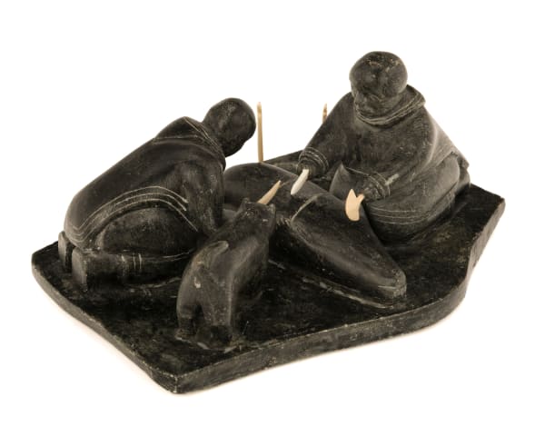 Lot 66 UNIDENTIFIED ARTIST, KUGLUKTUK (COPPERMINE) Preparing a Seal while a Pup Investigates, c. 1960s stone and antler, 3.5 x 7.25 x 5 in (8.9 x 18.4 x 12.7 cm) ESTIMATE: $600 — $900 PRICE REALIZED: $488.00