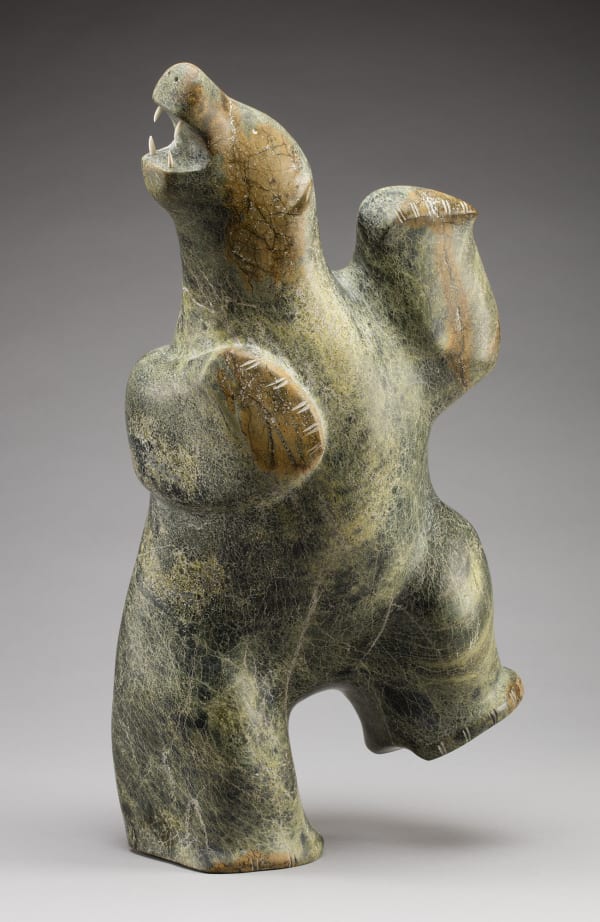 Lot 55 PAUTA SAILA, R.C.A. (1916-2009) KINNGAIT (CAPE DORSET) Dancing Bear, 1980-82 stone and antler, 21.5 x 12.5 x 8 in (54.6 x 31.8 x 20.3 cm) ESTIMATE: $50,000 — $80,000 Price Realized: $54,000