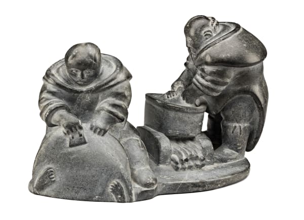Lot 146 JUANISIALU IRQUMIA (1912-1977) m., PUVIRNITUQ (POVUNGNITUK) Two Women Preparing Skins, 1958-60 stone, 6.25 x 10 x 6 in (15.9 x 25.4 x 15.2 cm) ESTIMATE: $5,000 — $8,000 Price Realized: $6,000