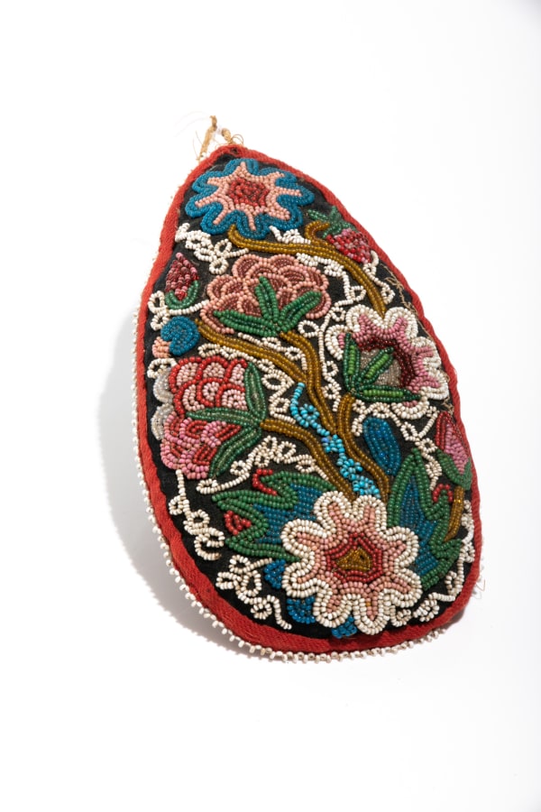 LOT 47 UNIDENTIFIED ARTIST Teardrop Shaped Beaded Whimsy Pincushion cloth, glass beads, and string, 7.25 x 4 x 1 in (18.4 x 10.2 x 2.5 cm) ESTIMATE: $150 — $250 Price Realized: $144