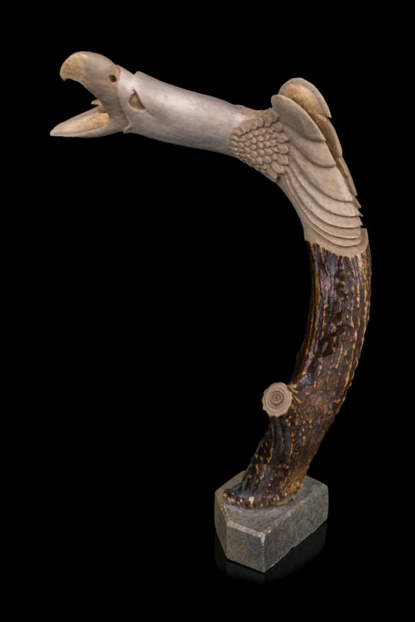 Lot 28 WAYNE SKYE (SKY) (1949-2012) CAYUGA (SIX NATIONS / HAUDENOSAUNEE CONFEDERACY) Fearsome Eagle, c. 2000s antler and stone, 10 x 6 x 4.25 in (25.4 x 15.2 x 10.8 cm) ESTIMATE: $100 — $200 PRICE REALIZED: $73.20