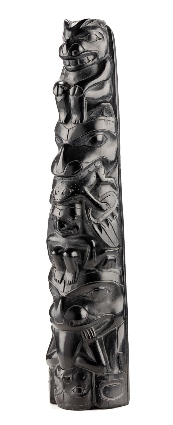 Lot 17 UNIDENTIFIED HAIDA ARTIST Hollow Back Model Totem Pole, c. 1890 argillite, 9.5 x 2.5 x 1.5 in (24.1 x 6.3 x 3.8 cm) ESTIMATE: $3,000 — $5,000 Price realized: $2,440.00