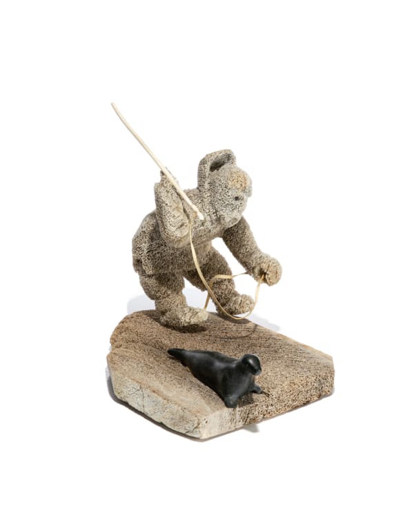 Lot 16 UNIDENTIFIED ARTIST, Probably NORTHERN QIKIQTAALUK (BAFFIN) Hunter Approaching a Seal, c. 1980s bone, stone, skin, and antler, 10.5 x 10.75 x 9 in (26.7 x 27.3 x 22.9 cm) PRICE REALIZED: $246.00