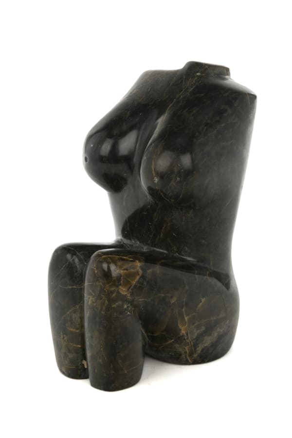 Lot 19 OVILOO TUNNILLIE, R.C.A. (1949-2014) KINNGAIT (CAPE DORSET) Torso, mid 1990s stone, 6.25 x 3.5 x 5.75 in (15.9 x 8.9 x 14.6 cm) ESTIMATE: $1,200 — $1,800 PRICE REALIZED: $2,440.00