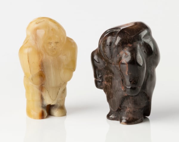 Lot 148 BARNABUS ARNASUNGAAQ (1924-2017) QAMANI'TUAQ (BAKER LAKE) Two Standing Women, c. 1970-71 the first: muskox horn and graphite, 1.25 x 0.65 x 0.65 in (3 x 1.7 x 1.5 cm) ESTIMATE: $600 — $900 PRICE REALIZED: $720.00