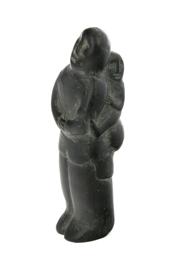 14 MIRIAM NANURLUQ QIYUK (1933-2016) QAMANI'TUAQ (BAKER LAKE) Father Piggybacking Young Child, late 1970s stone, 4.75 x 1.5 x 1.5 in (12.1 x 3.8 x 3.8 cm)