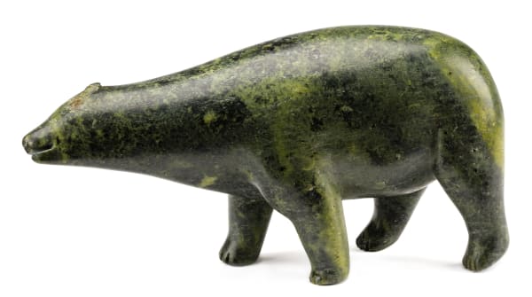 Lot 1 Possibly PAUTA SAILA, R.C.A. (1916-2009) KINNGAIT (CAPE DORSET) Polar Bear, c. 1957-60 stone, 4.5 x 10 x 2.75 in (11.4 x 25.4 x 7 cm) ESTIMATE: $3,000 — $5,000 PRICE REALIZED: $4,800.00