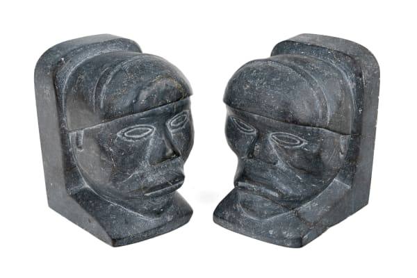 Lot 62 PAULOSIE KASUDLUAK (1938-) INUKJUAK (PORT HARRISON) Bookends with Paired Profiles, 1963 each stone, each 4 x 3.5 x 2.75 in (10.2 x 8.9 x 7 cm) ESTIMATE: $300 — $500 PRICE REALIZED: $146.40