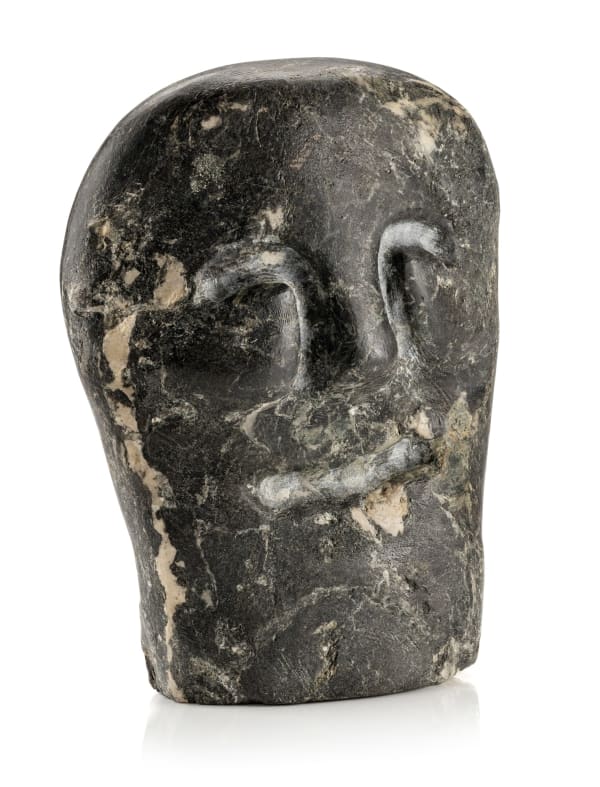 Lot 87 JOHN TIKTAK, R.C.A. (1916-1981) KANGIQLINIQ (RANKIN INLET) Head, early 1970s stone, 9.75 x 7.75 x 2.75 in (24.8 x 19.7 x 7 cm) ESTIMATE: $7,000 — $10,000 PRICE REALIZED: $6,500.00