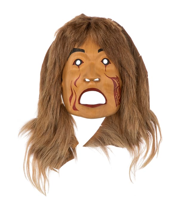 Lot 79 STAN GREENE (1953-) COAST SALISH, CULTUS LAKE, B.C. Salmon Woman Mask, 1982 alder wood, acrylic paint, and goat fur, 15.5 x 11 x 4.5 in (39.4 x 27.9 x 11.4 cm) ESTIMATE: $400 — $600 PRICE REALIZED: $1,440.00