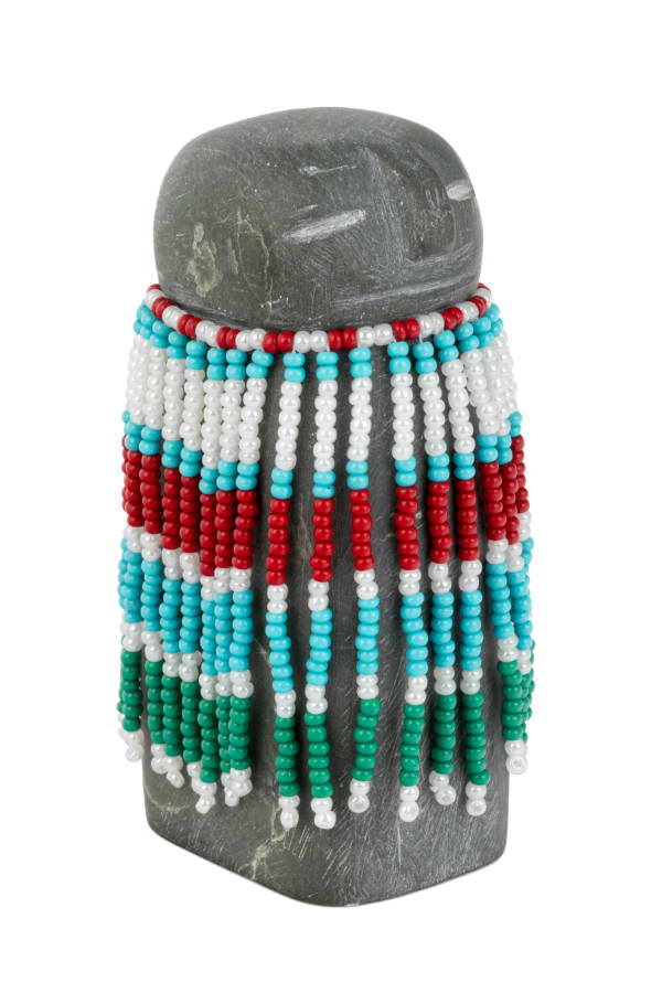 Lot 39 ALICE SAKITNAK AKAMMAK (1940-) ARVIAT (ESKIMO POINT) Woman in a Beaded Amautiq, stone, beads, and cotton thread, 3.5 x 1.5 x 2 in (8.9 x 3.8 x 5.1 cm) ESTIMATE: $200 — $400 PRICE REALIZED: $366