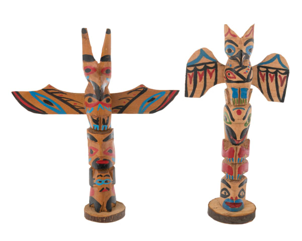Lot 87 UNIDENTIFIED NUU-CHAH-NULTH ARTIST Two Model Totem Poles, c. 1930s / 1940s each wood and acrylic paint, the first: 8.75 x 4.5 x 2.25 in (22.2 x 11.4 x 5.7 cm) / the second: 8.5 x 7.5 x 1.75 in (21.6 x 19.1 x 4.4 cm) ESTIMATE: $100 — $150 PRICE REALIZED: $85.40