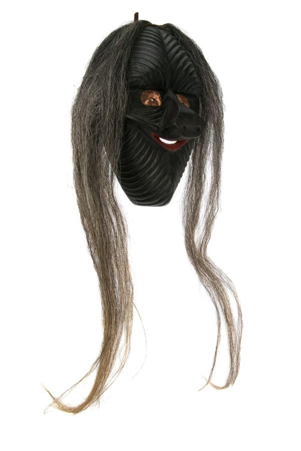 Lot 89 (HADAJIGRE:TA') JACOB EZRA THOMAS (1922-1998) CAYUGA, HAUDENOSAUNEE (IROQUOIS) Wolf Mohawk Clan Mask, c. 1970s wood, acrylic, copper, and horse hair, 11 x 6.75 x 5.25 in (27.9 x 17.1 x 13.3 cm) ESTIMATE: $200 — $300 PRICE REALIZED: $576.00