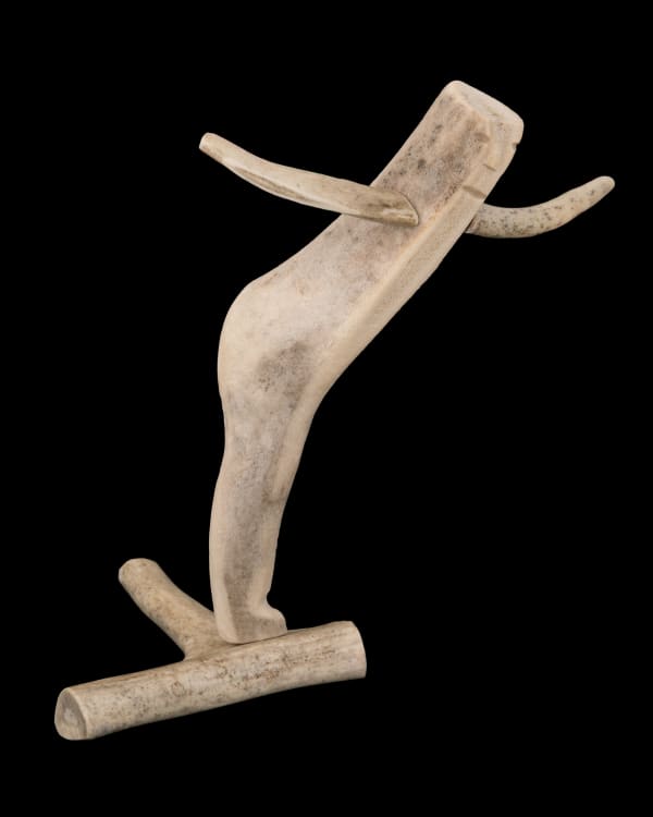 Lot 26 LUKE ANOWTALIK (1932-2006) ARVIAT (ESKIMO POINT) Balancing Man, early 1980s antler, 7.5 x 5.5 x 6.5 in (19.1 x 14 x 16.5 cm) ESTIMATE: $400 — $600 PRICE REALIZED: $170.80