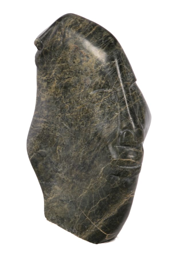 Lot 68 JUTAI TOONOO (1959-2015) KINNGAIT (CAPE DORSET) The People From Newfoundland Has [sic] All the Jobs and We are Still 70% Unemployed, 2007 stone, 21 x 15 x 7 in (53.3 x 38.1 x 17.8 cm) ESTIMATE: $900 — $1,200