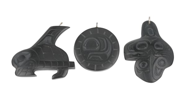 Lot 28 PAT DIXON (1938-2015) HAIDA / CALVIN BELL (1950-), HAIDA, MASSET / RICHARD SILAS YELTATZIE (1955-1974) HAIDA Three Pendants, Oct 2002 / c. 2000s / Jan 1974 each argillite, the first an opposing eagle and killer whale by Pat Dixon, 2.5 x 2 x 0.25 in (6.3 x 5.1 x 0.6 cm) ESTIMATE: $200 — $300 PRICE REALIZED: $231.80