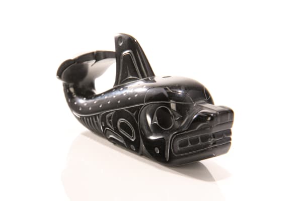Lot 107 DENNY DIXON (1944-) HAIDA, SKIDEGATE, HAIDA GWAII Haida Killer Whale, November 1983 argillite, 2.75 x 6 x 1.25 (7 x 15.2 x 3.2 cm) ESTIMATE: $300 — $400 PRICE REALIZED: $900.00