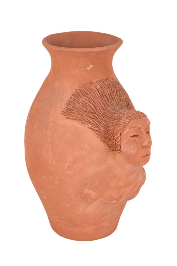 Lot 18 ROGER AKSADJUAK (1972-) KANGIQLINIQ (RANKIN INLET) / WINNIPEG, MB Vase with Emerging Sedna Figure, 30 June 1995 unglazed ceramic, 9.25 x 4.75 x 4.25 in (23.5 x 12.1 x 10.8 cm) ESTIMATE: $400 — $600 PRICE REALIZED: $366.00