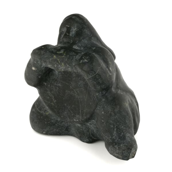 Lot 12 BARNABUS ARNASUNGAAQ (1924-2017) QAMANI'TUAQ (BAKER LAKE) Seated Woman Softening a Skin, c. late 1980s stone, 4 x 4 x 3 in (10.2 x 10.2 x 7.6 cm) ESTIMATE: $400 — $600