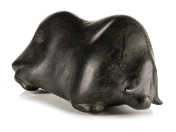 Lot 73 BARNABUS ARNASUNGAAQ (1924-2017) QAMANI'TUAQ (BAKER LAKE) Muskox, 1984 stone, 3.5 x 9 x 4 in (8.9 x 22.9 x 10.2 cm) ESTIMATE: $2,500 — $3,500 PRICE REALIZED: $2,400.00