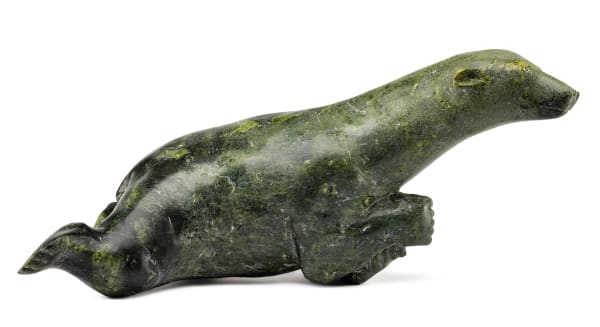 Lot 157 TOWATUGA SAGOUK (1934-) IQALUIT (FROBISHER BAY) Swimming Polar Bear, c. early 1970s stone, 12.25 x 33 x 13 in (31.1 x 83.8 x 33 cm) ESTIMATE: $4,000 — $6,000 PRICE REALIZED: $3,680.00