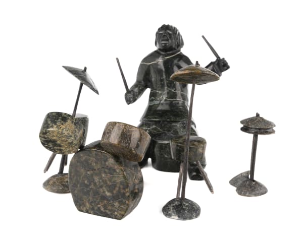 3 PITSEOLAK QIMIRPIK (1986-) KINNGAIT (CAPE DORSET) Drummer, 2000s stone and wood, dimensions variable, the figure: 4.75 x 3.5 x 3.25 in (12.1 x 8.9 x 8.3 cm)