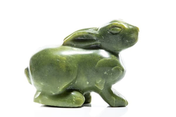 Lot 2 PAULOOSIE MICHAEL (1960-) KIMMIRUT (LAKE HARBOUR) Scenting Arctic Hare, 1986 stone, 4.75 x 6.5 x 2.5 in (12.1 x 16.5 x 6.3 cm) PRICE REALIZED: $492.00