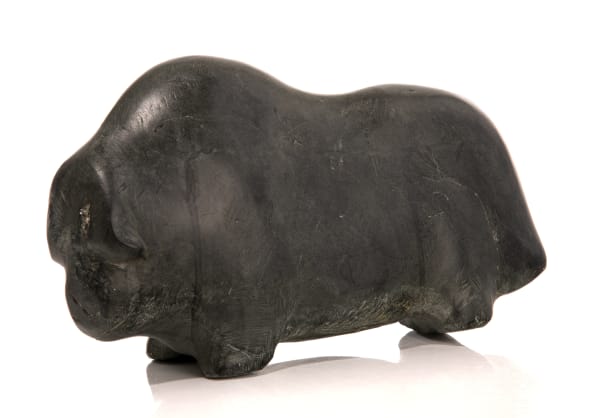 Lot 28 BARNABUS ARNASUNGAAQ (1924-2017) QAMANI'TUAQ (BAKER LAKE) Muskox, 1987 stone, 5.75 x 11.25 x 3 in (14.6 x 28.6 x 7.6 cm) ESTIMATE: $1,000 — $1,500 PRICE REALIZED: $900.00