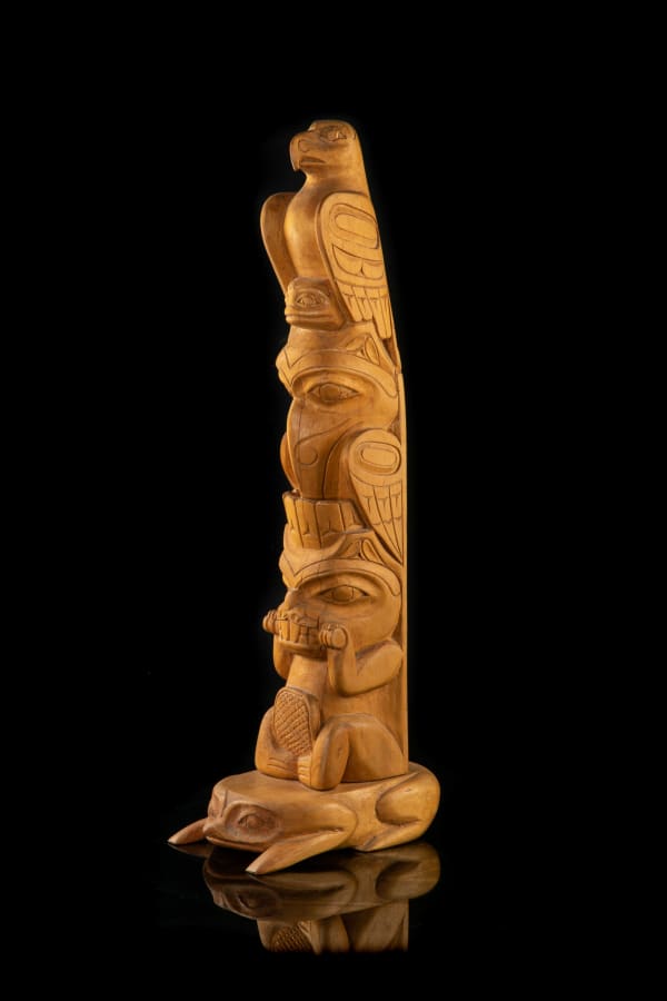 LOT 16 Attr: DOUG LAFORTUNE SR. (1953-) COAST SALISH Model Totem yellow cedar, 22 x 5.75 x 9 in (55.9 x 14.6 x 22.9 cm) ESTIMATE: $400 — $600 PRICE REALIZED: 3,360.00