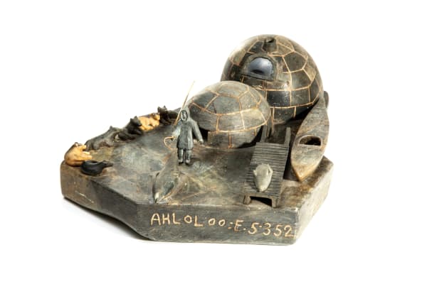 LOT 49 ALOOLOO INUTIQ (1932-1985) KANGIQTUGAAPIK (CLYDE RIVER) Tableaux Camp Scene with Igloo, Man, and Dog Team, mid 1960s stone, ivory, plastic, antler and string, 4.25 x 14 x 9 in (10.8 x 35.6 x 22.9 cm) ESTIMATE: $700 — $1,000