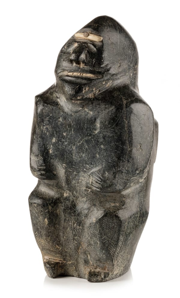 Lot 45 JOHN KAVIK (1897-1993) KANGIQLINIQ (RANKIN INLET) Father and Son Wearing Snow Goggles , c. 1960s stone, antler, and metal, 12 x 5.75 x 5.75 in (30.5 x 14.6 x 14.6 cm) ESTIMATE: $20,000 — $30,000 PRICE REALIZED: $24,000.00