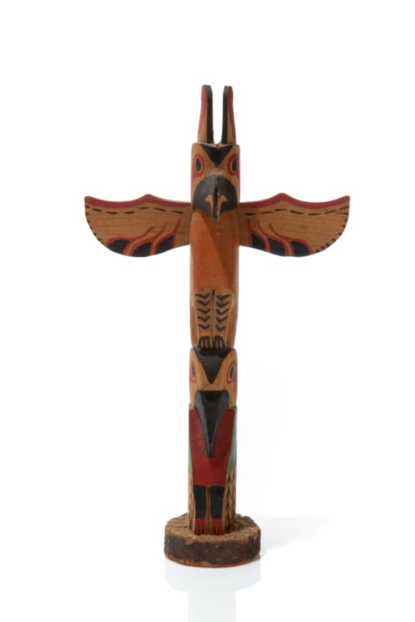 LOT 37 UNIDENTIFIED NORTHWEST COAST ARTIST Model Totem carved and painted wood, 7.5 x 4.25 1.5 in (19.1 x 10.8 cm) ESTIMATE: $200 — $300