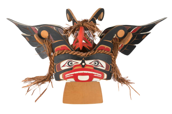 Lot 46 STAN WAMISS (1947-2023) DZAWADA'ENUXW (TSAWATAINEUK) / KWAKWA̱KA̱ʼWAKW, KINGCOME INLET, B.C. Sisiutl Headdress with Thunderbird, 2000 carved cedar, cedar bark, and acrylic paint, dimensions variable: 12 x 32.5 x 24 in (30.5 x 82.5 x 61 cm) ESTIMATE: $1,800 — $2,800 PRICE REALIZED: $1,952.00